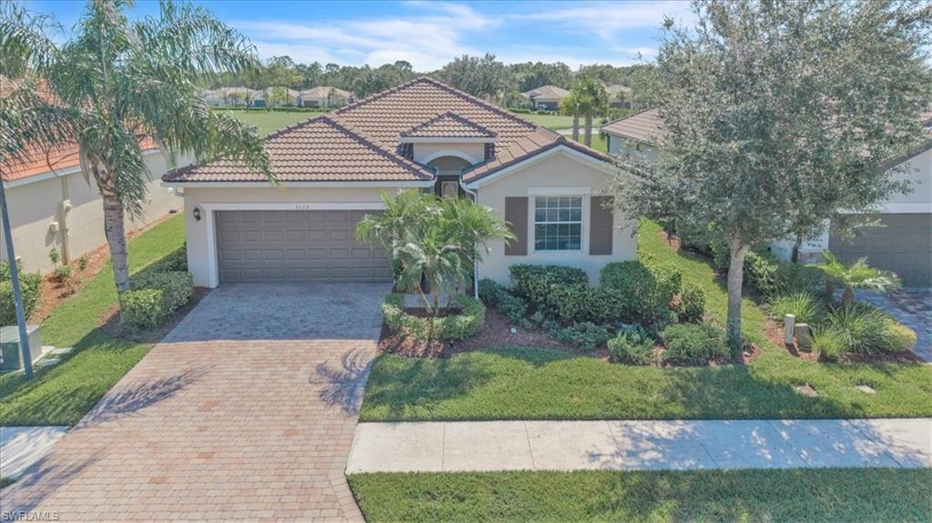 3112 Walnut Grove Lane Alva, FL 33920 - Photo 2 of 50 a house that has a tree in front of the house