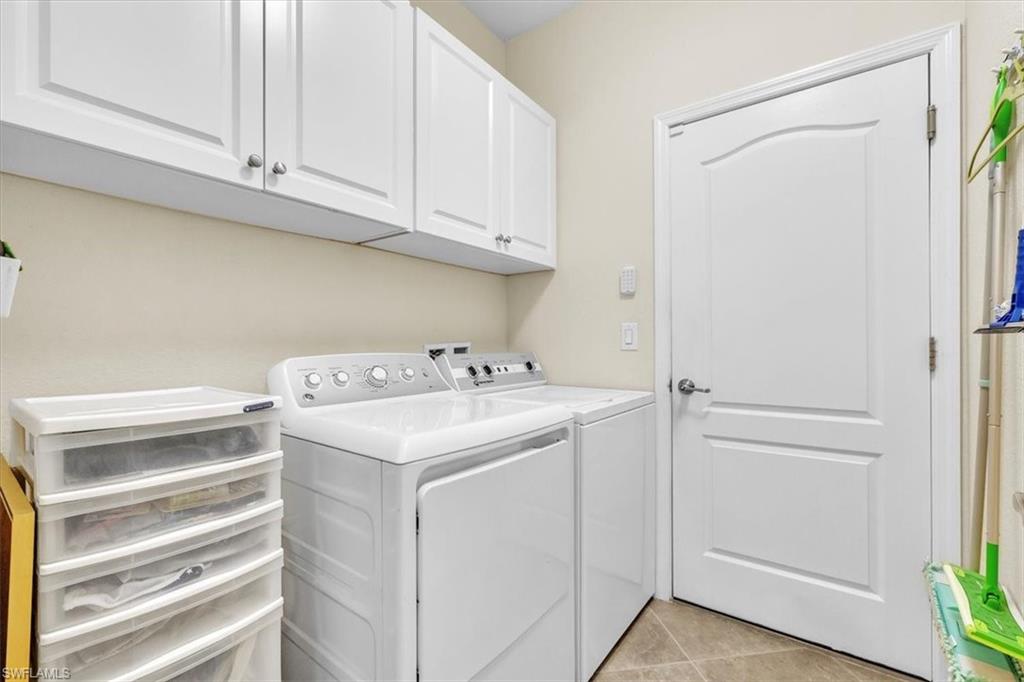 3112 Walnut Grove Lane Alva, FL 33920 - Photo 32 of 50 a utility room with dryer and washer