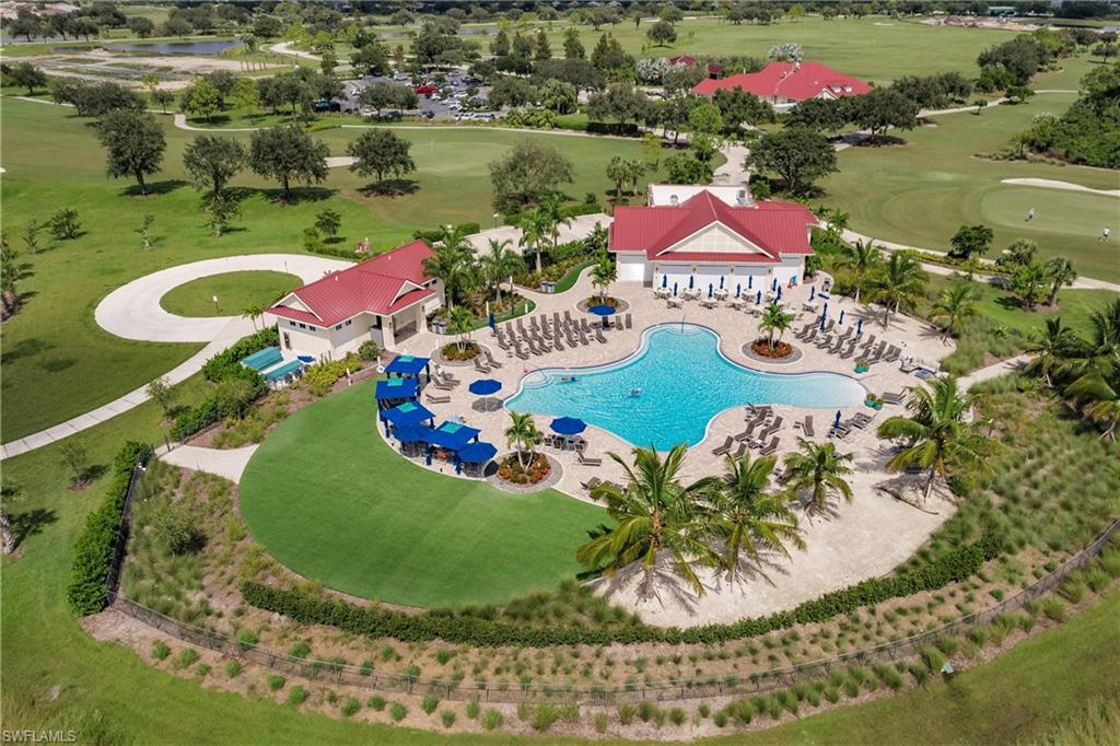 3112 Walnut Grove Lane Alva, FL 33920 - Photo 43 of 50 a view of a swimming pool with a yard