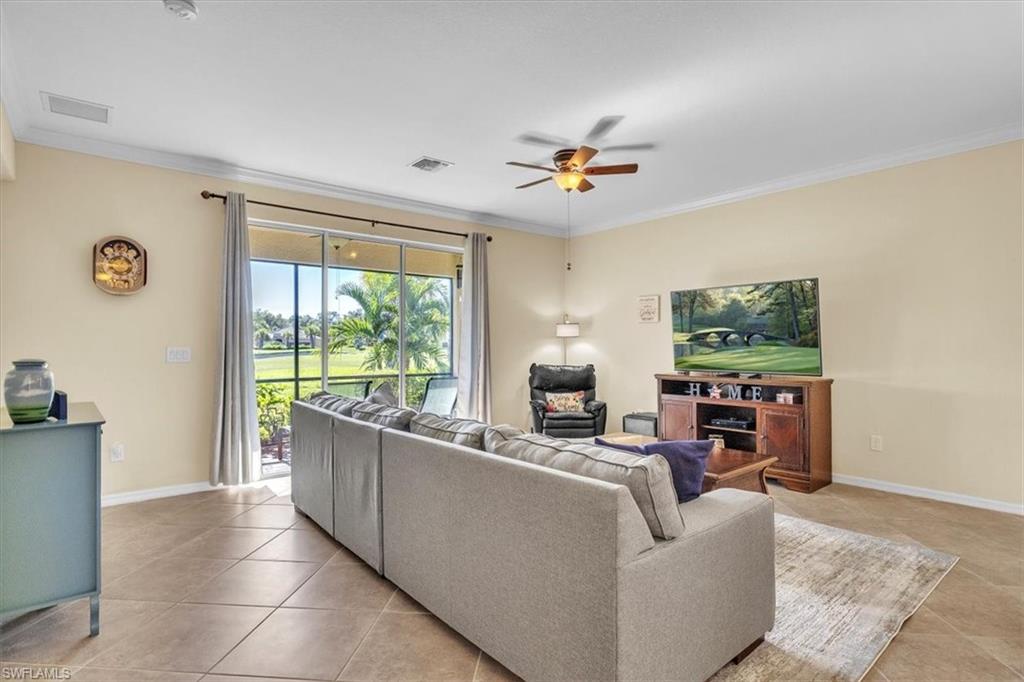 3112 Walnut Grove Lane Alva, FL 33920 - Photo 8 of 50 a living room with furniture and a flat screen tv
