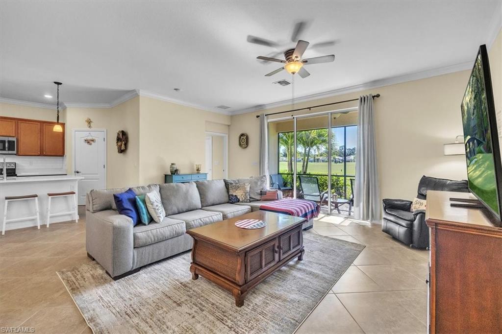 3112 Walnut Grove Lane Alva, FL 33920 - Photo 10 of 50 a living room with furniture and a large window