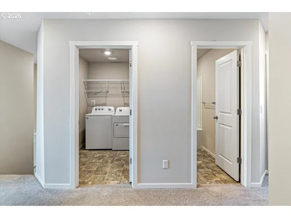a view of a bathroom with a glass door