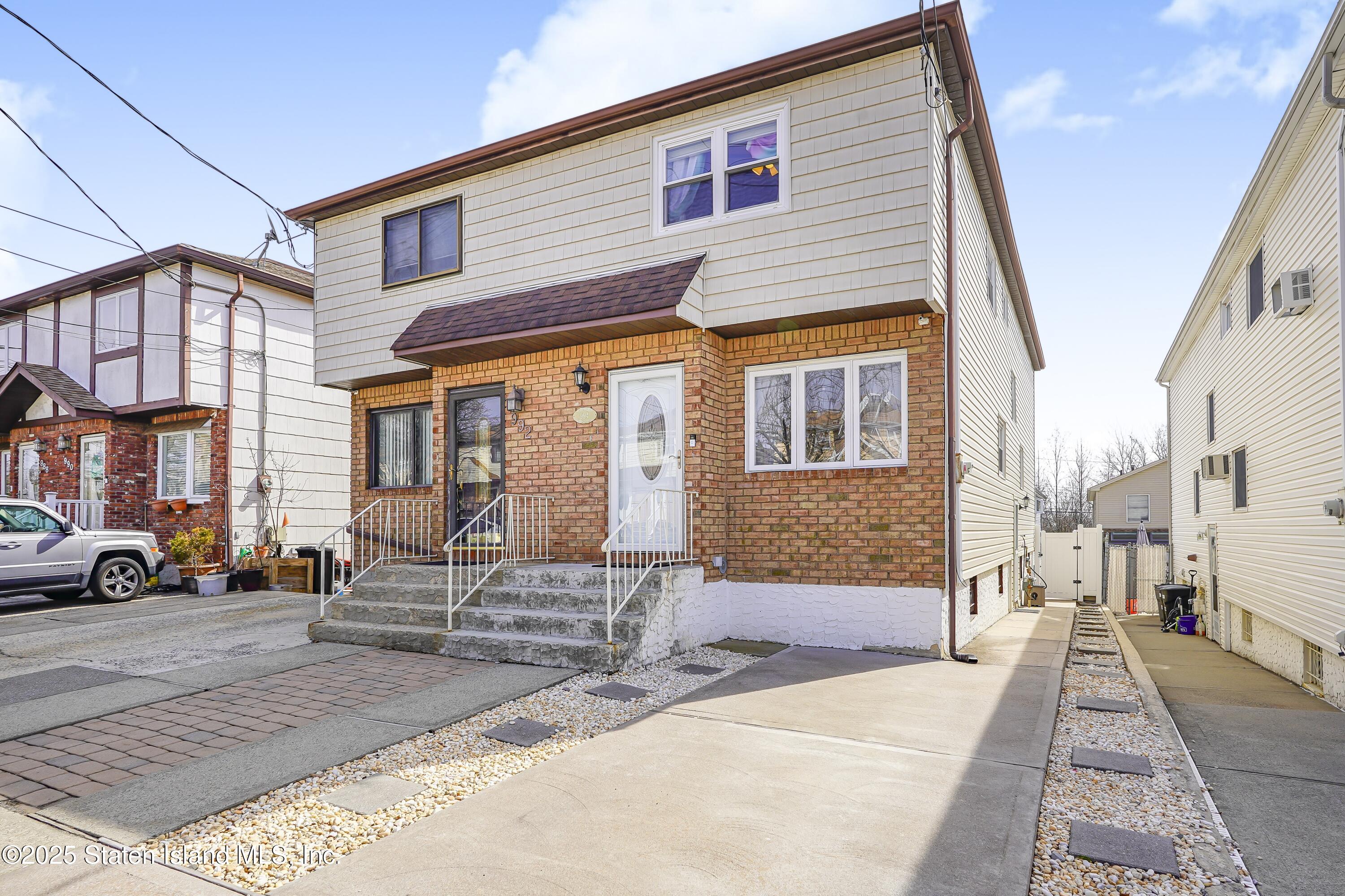 a front view of a house with a patio