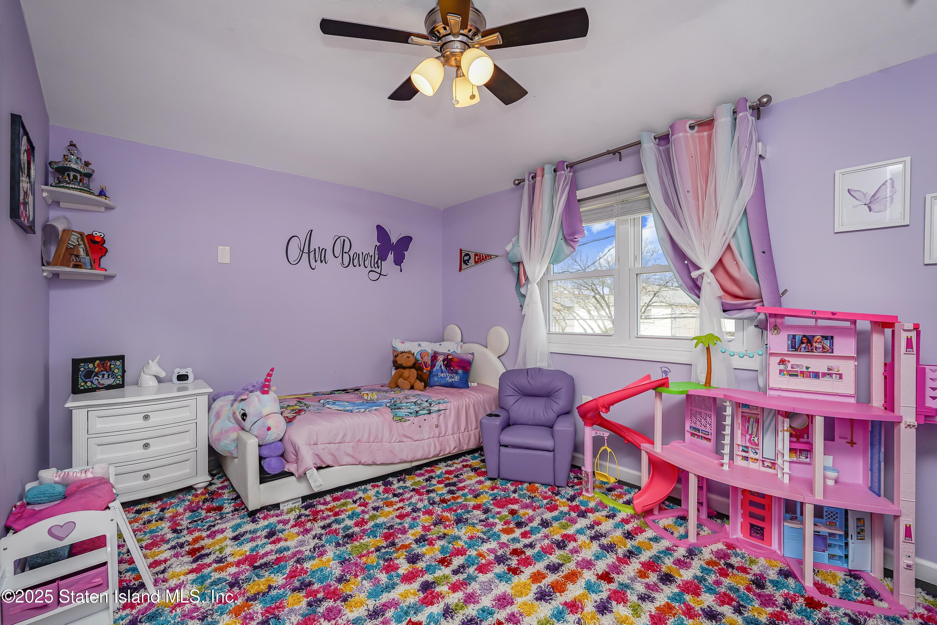 994 Rensselaer Avenue Staten Island, NY 10309 - Photo 21 of 34 a bedroom with furniture and a window