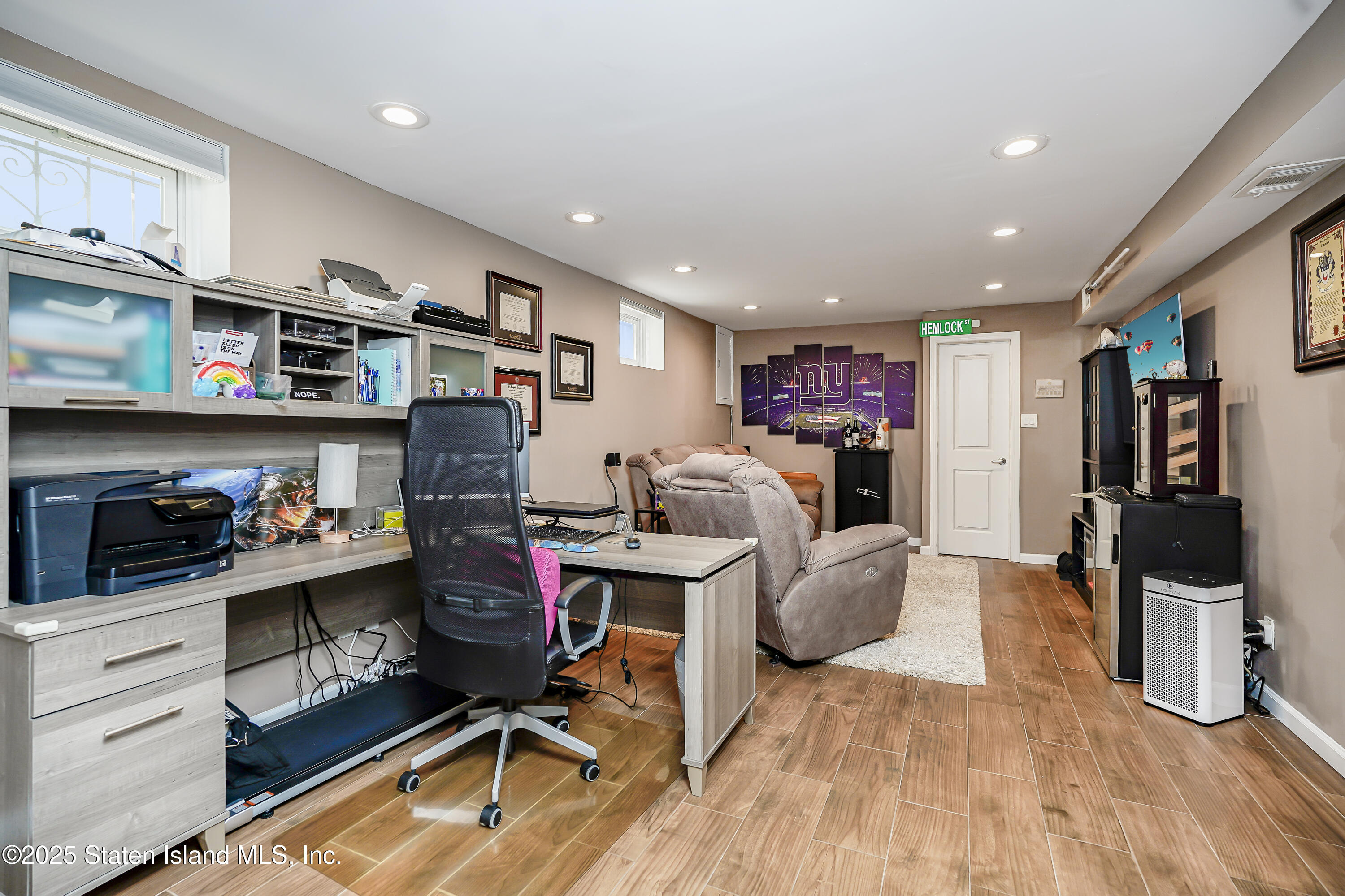 994 Rensselaer Avenue Staten Island, NY 10309 - Photo 26 of 34 a living room with furniture and a flat screen tv