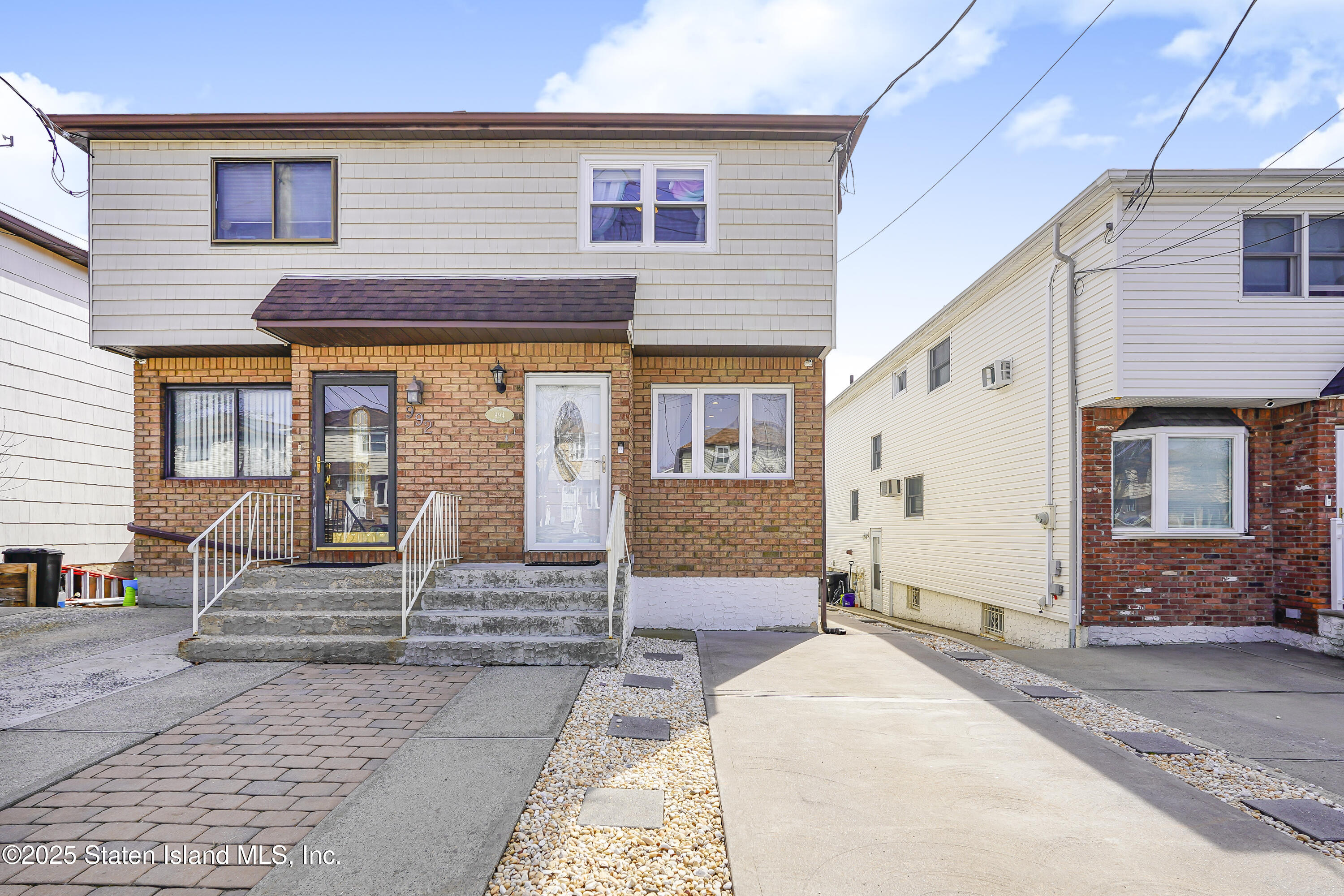 994 Rensselaer Avenue Staten Island, NY 10309 - Photo 34 of 34 a front view of a house with barbeque
