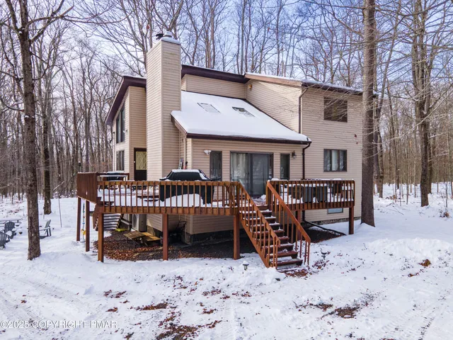 a view of a chairs and tables in the patio