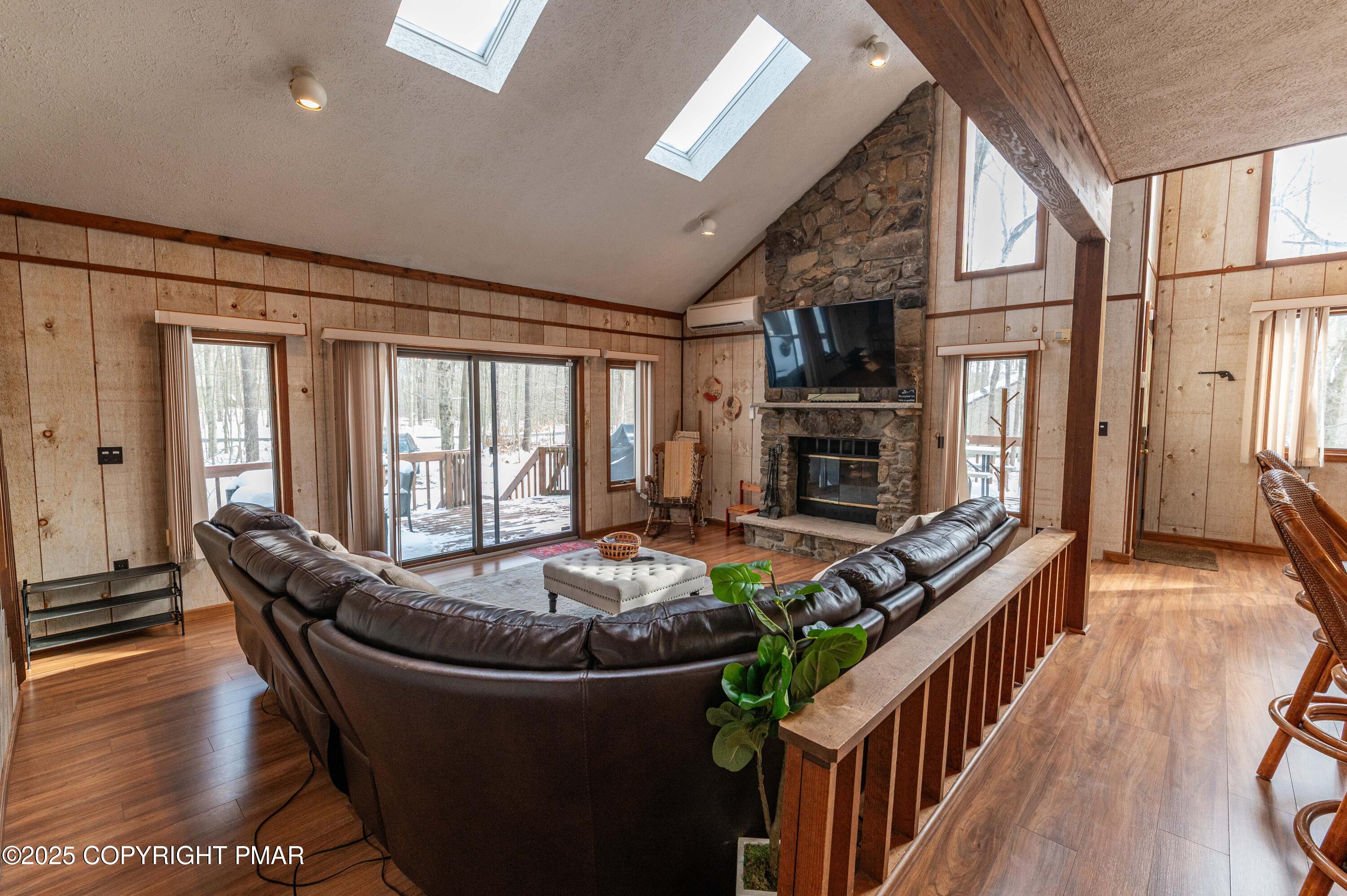 178 Cardinal Drive, Unit R2108 Gouldsboro, PA 18424 - Photo 17 of 58 a living room with furniture fireplace and flat screen tv