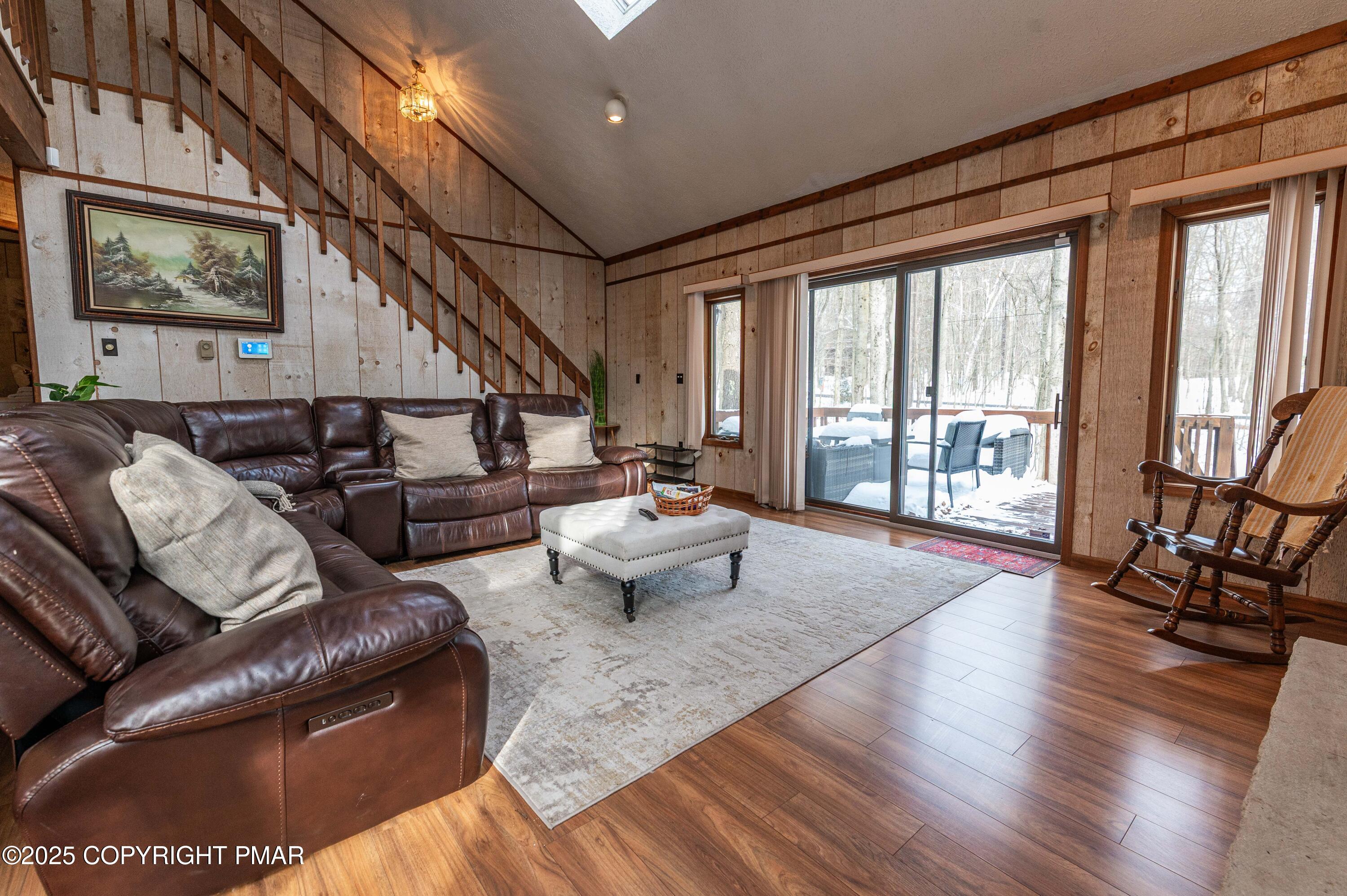 178 Cardinal Drive, Unit R2108 Gouldsboro, PA 18424 - Photo 19 of 58 a living room with furniture and a large window
