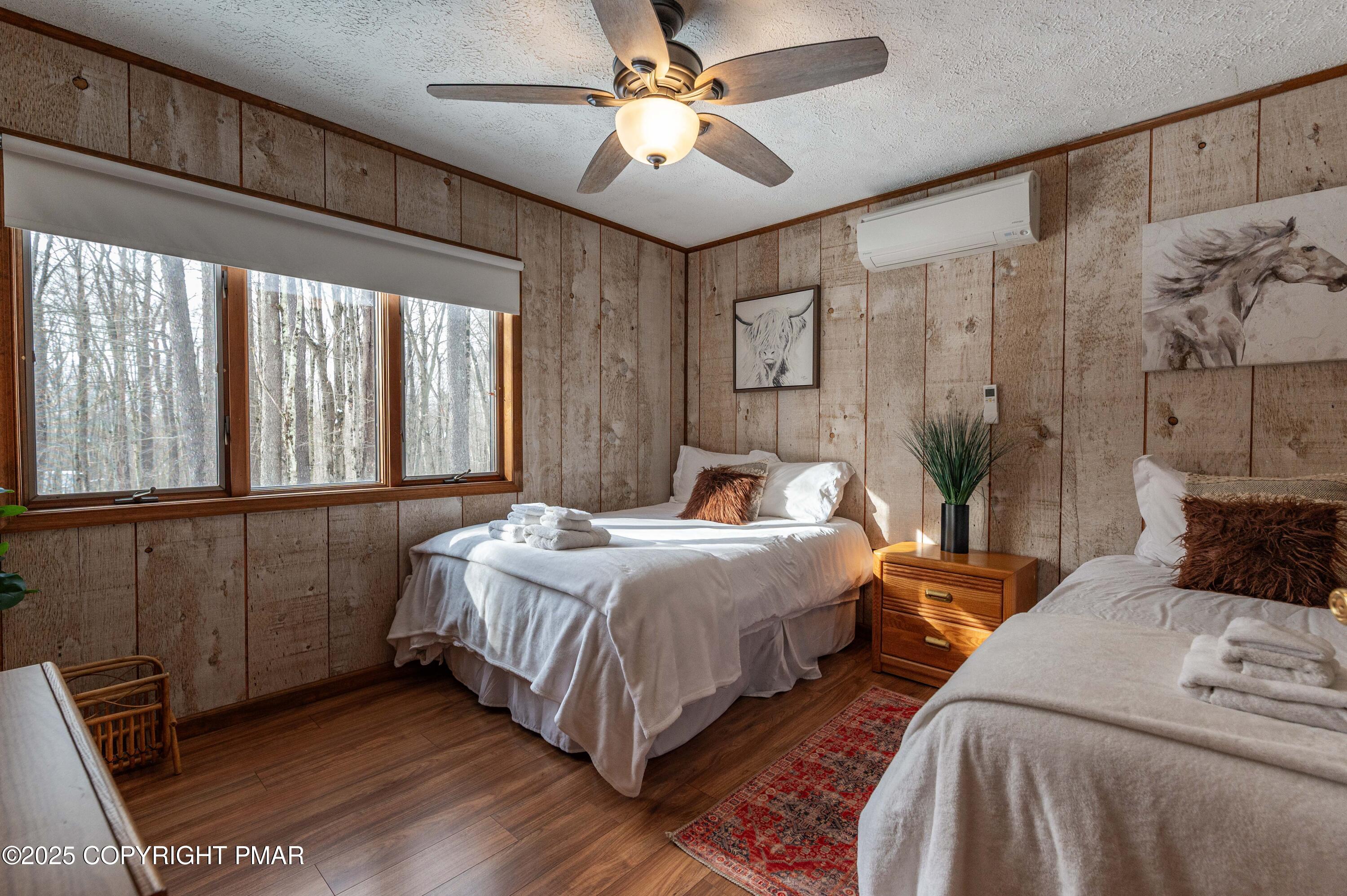 178 Cardinal Drive, Unit R2108 Gouldsboro, PA 18424 - Photo 21 of 58 a bedroom with a bed and a window