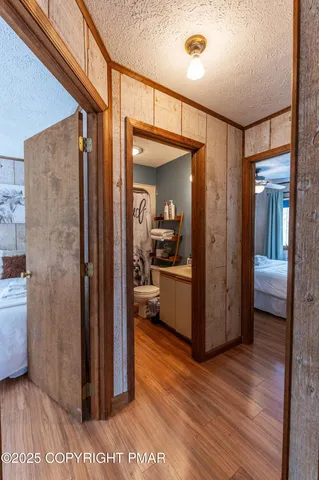 a view of balcony with wooden floor