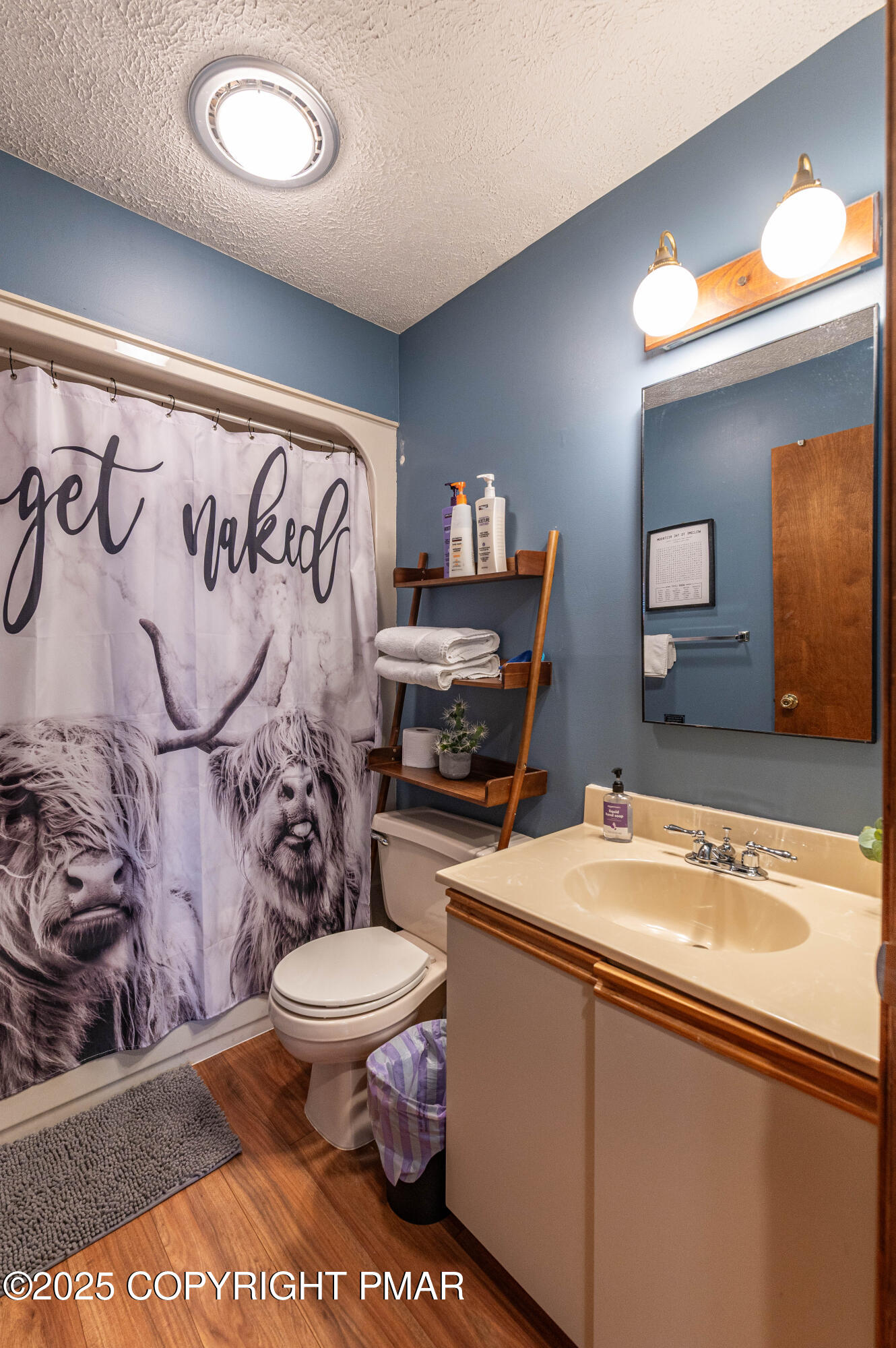 178 Cardinal Drive, Unit R2108 Gouldsboro, PA 18424 - Photo 26 of 58 a bathroom with a sink a toilet and a mirror
