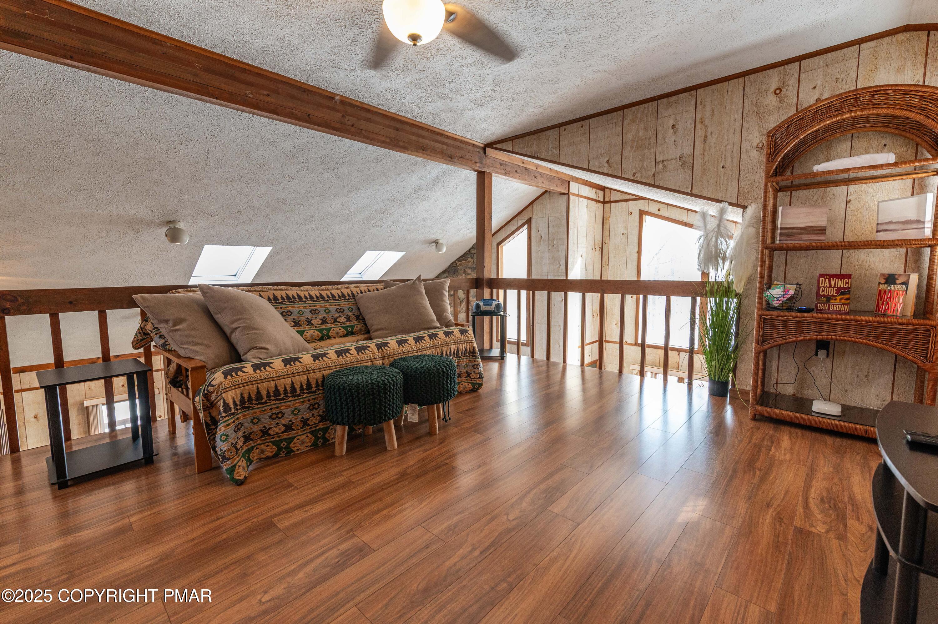 178 Cardinal Drive, Unit R2108 Gouldsboro, PA 18424 - Photo 28 of 58 a living room with furniture and a wooden floor
