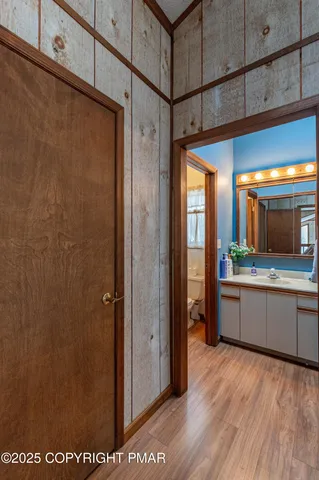a white toilet sitting next to a shower curtain