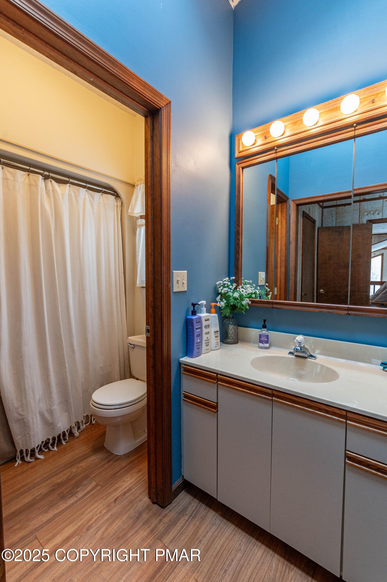 178 Cardinal Drive, Unit R2108 Gouldsboro, PA 18424 - Photo 35 of 58 a bathroom with a toilet sink and mirror
