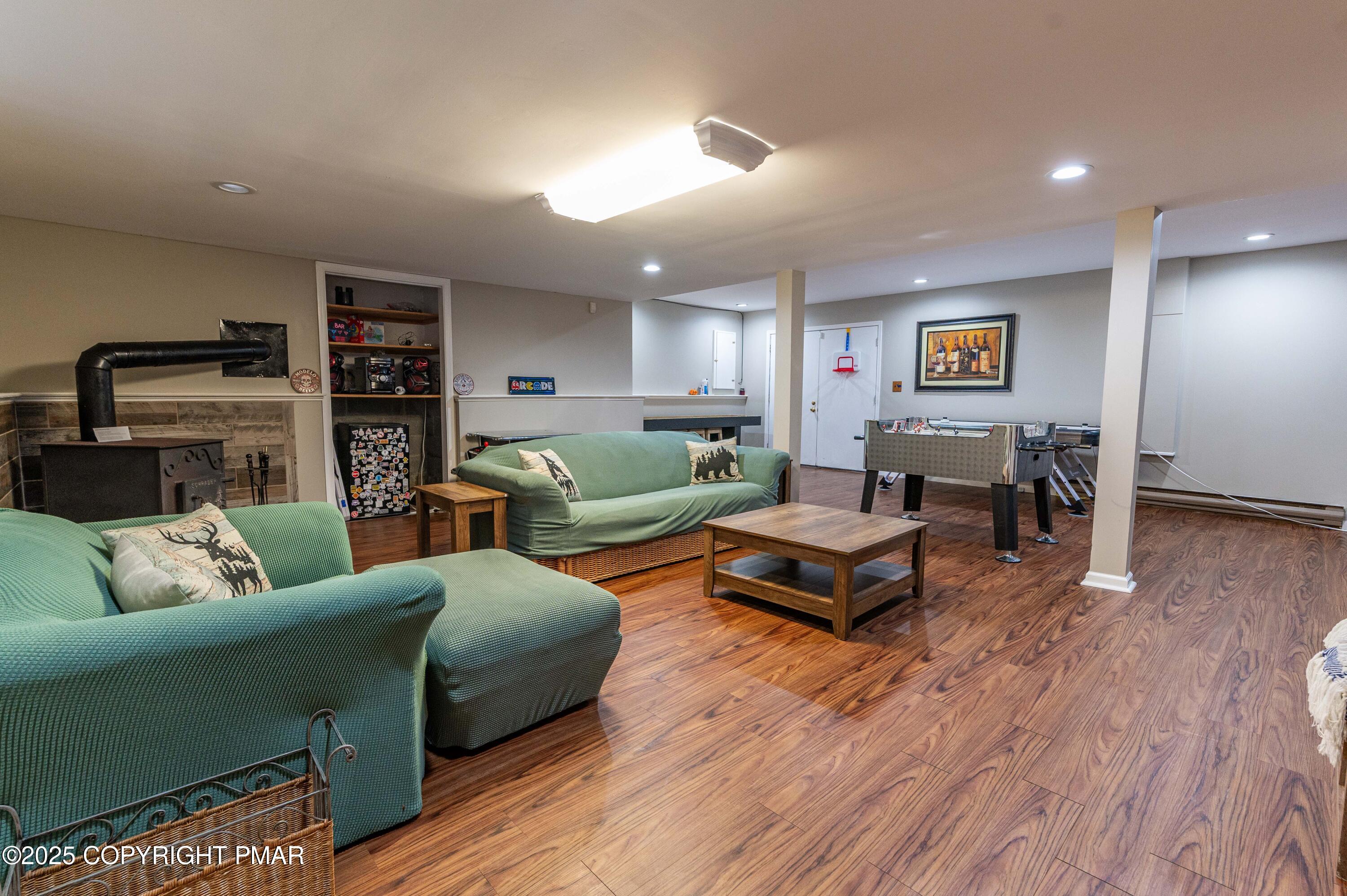 178 Cardinal Drive, Unit R2108 Gouldsboro, PA 18424 - Photo 40 of 58 a living room with furniture and wooden floor
