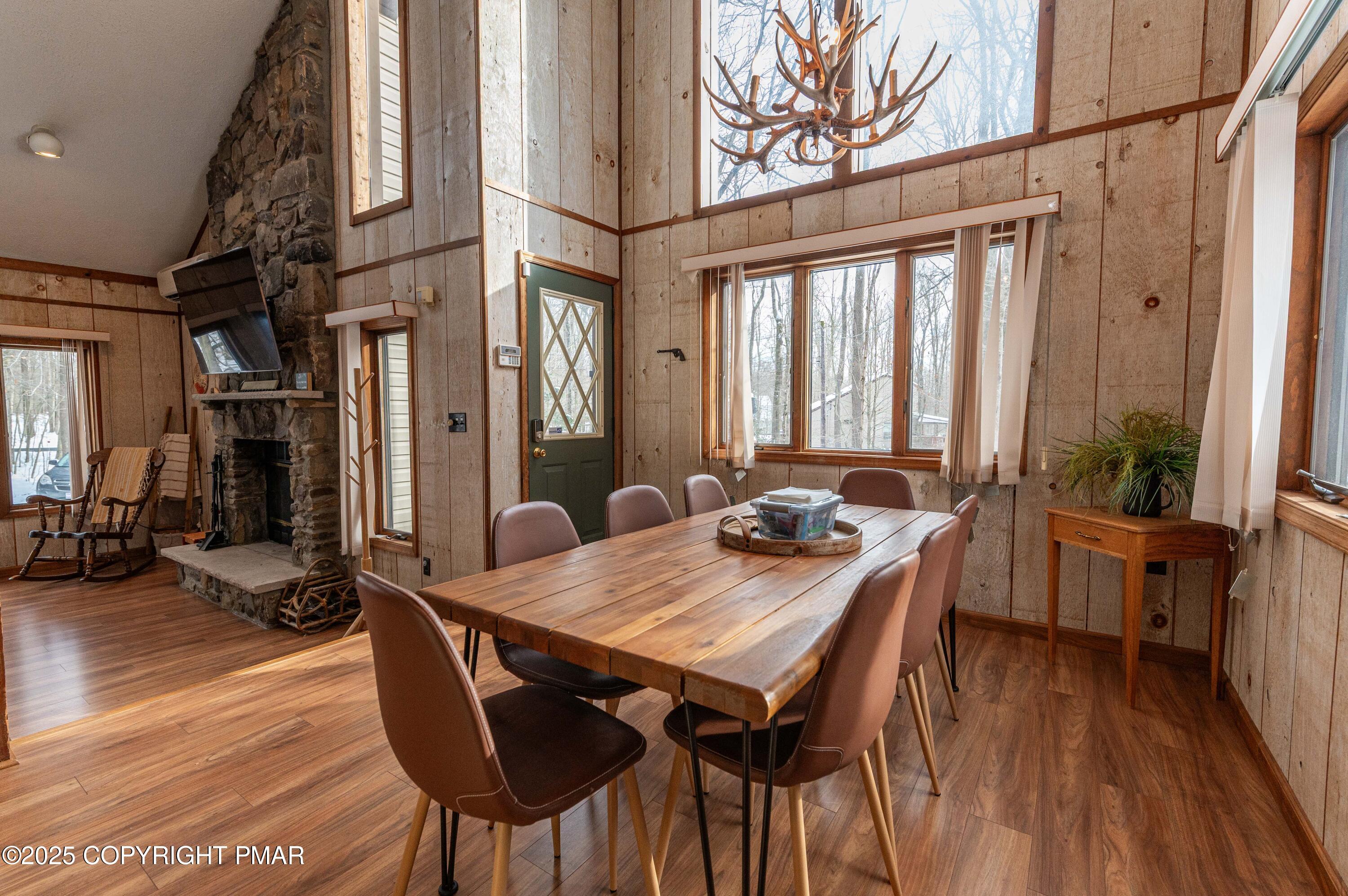 178 Cardinal Drive, Unit R2108 Gouldsboro, PA 18424 - Photo 4 of 58 a view of a dining room with furniture window and wooden floor