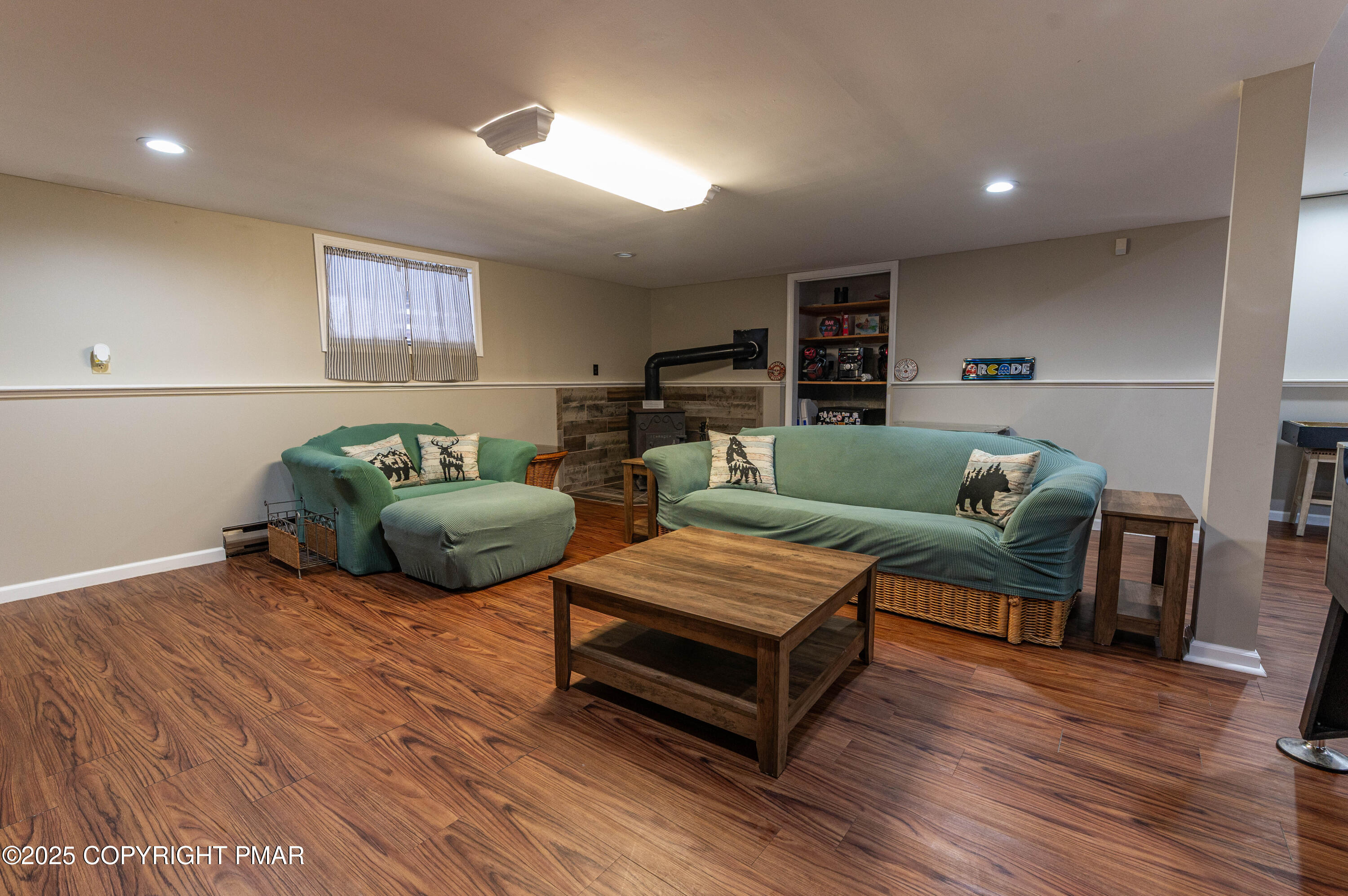 178 Cardinal Drive, Unit R2108 Gouldsboro, PA 18424 - Photo 41 of 58 a living room with furniture and wooden floor