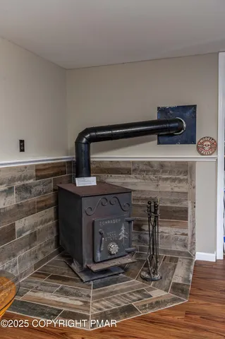 a view of a patio with wooden floor