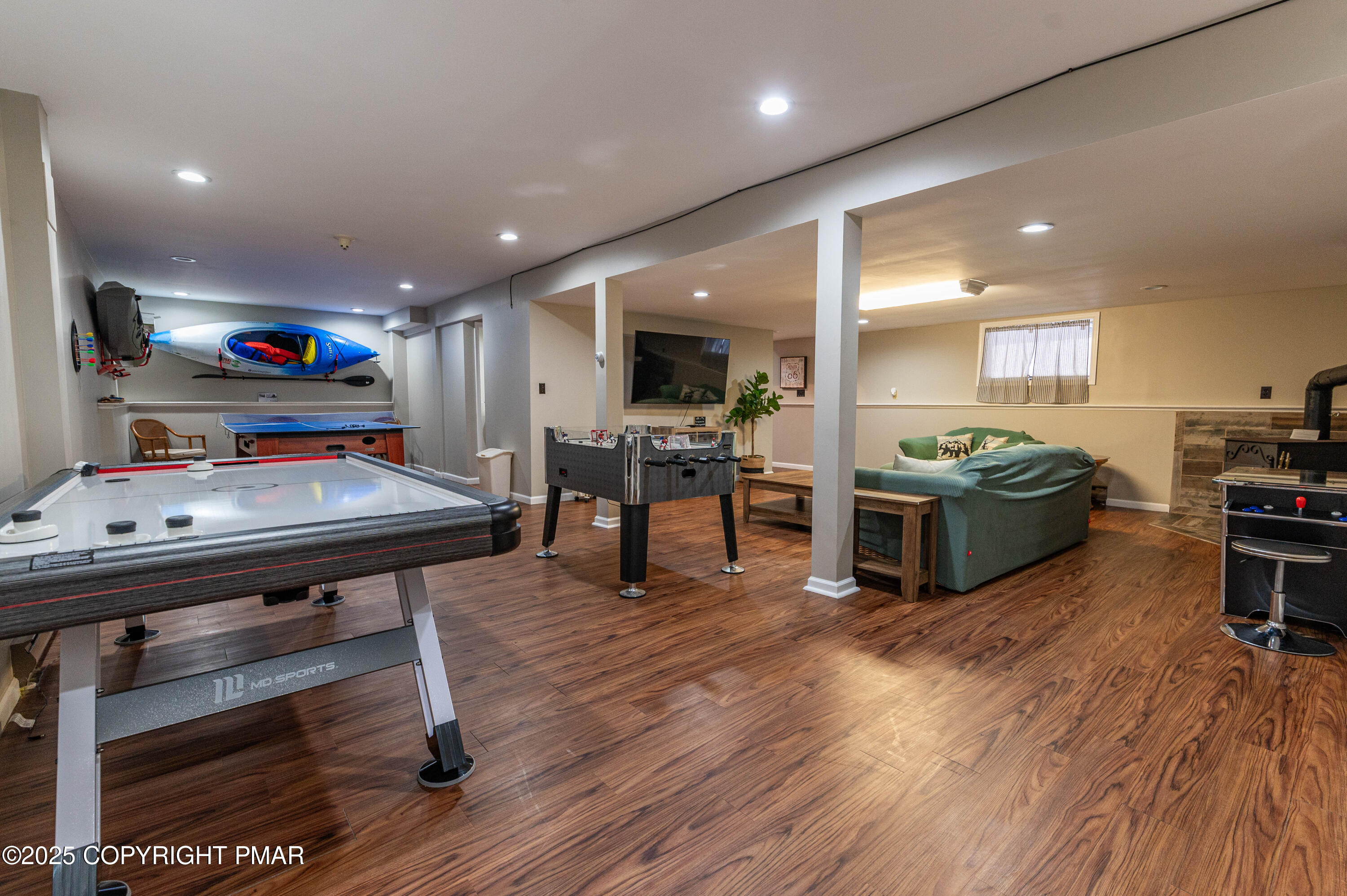 178 Cardinal Drive, Unit R2108 Gouldsboro, PA 18424 - Photo 43 of 58 a living room with furniture and a wooden floor