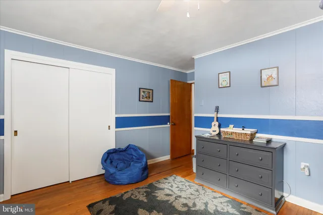 a living room with a fireplace and a table