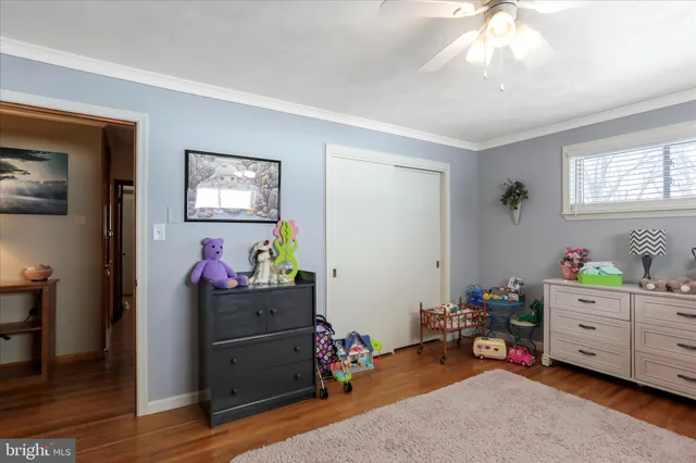 a kitchen with stainless steel appliances granite countertop a sink a stove top oven a counter space and cabinets