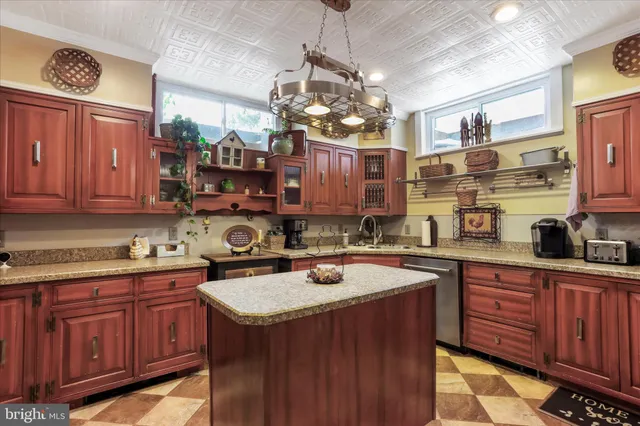 a view of a house with a yard covered with snow in front of house