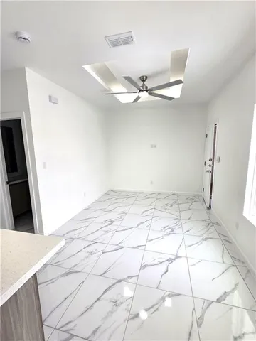 a view of a room with an empty space