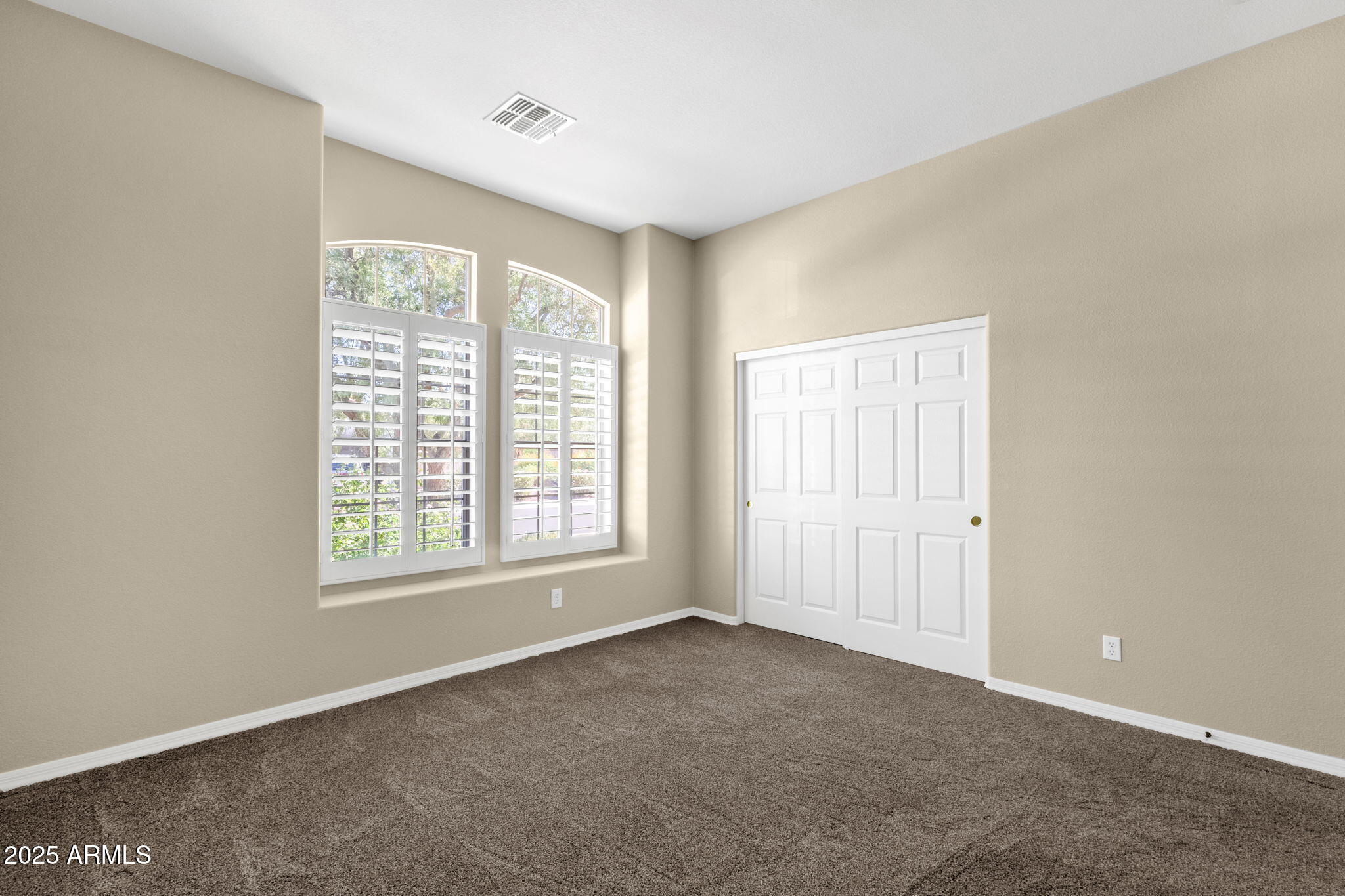4735 East Azalea Drive Gilbert, AZ 85298 - Photo 20 of 37 a view of an empty room with a window