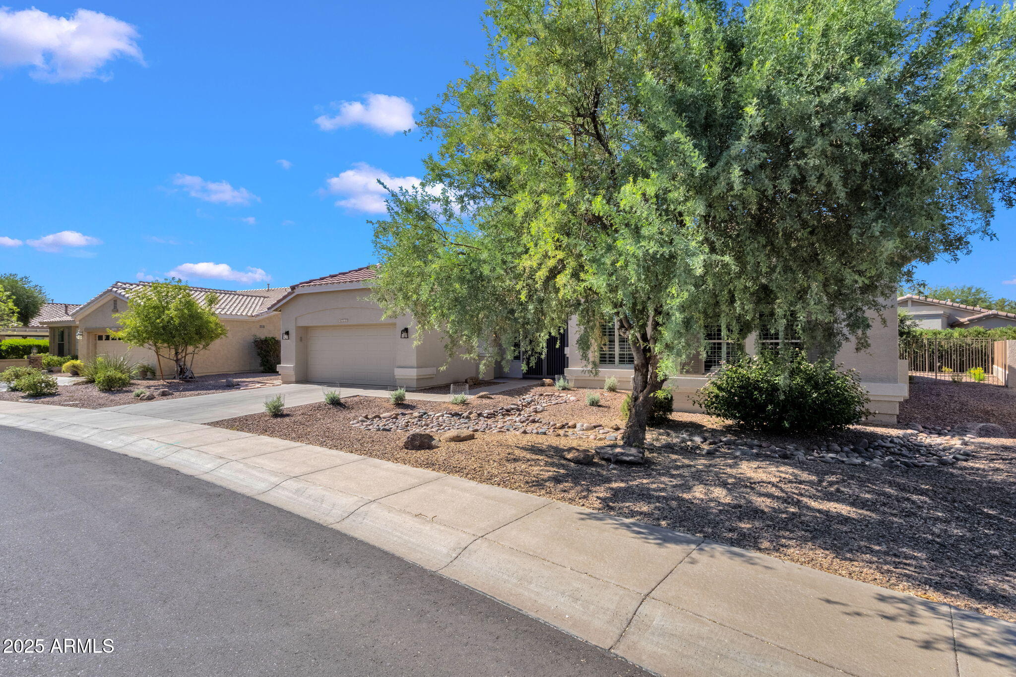 4735 East Azalea Drive Gilbert, AZ 85298 - Photo 2 of 37 a view of a backyard with sitting area