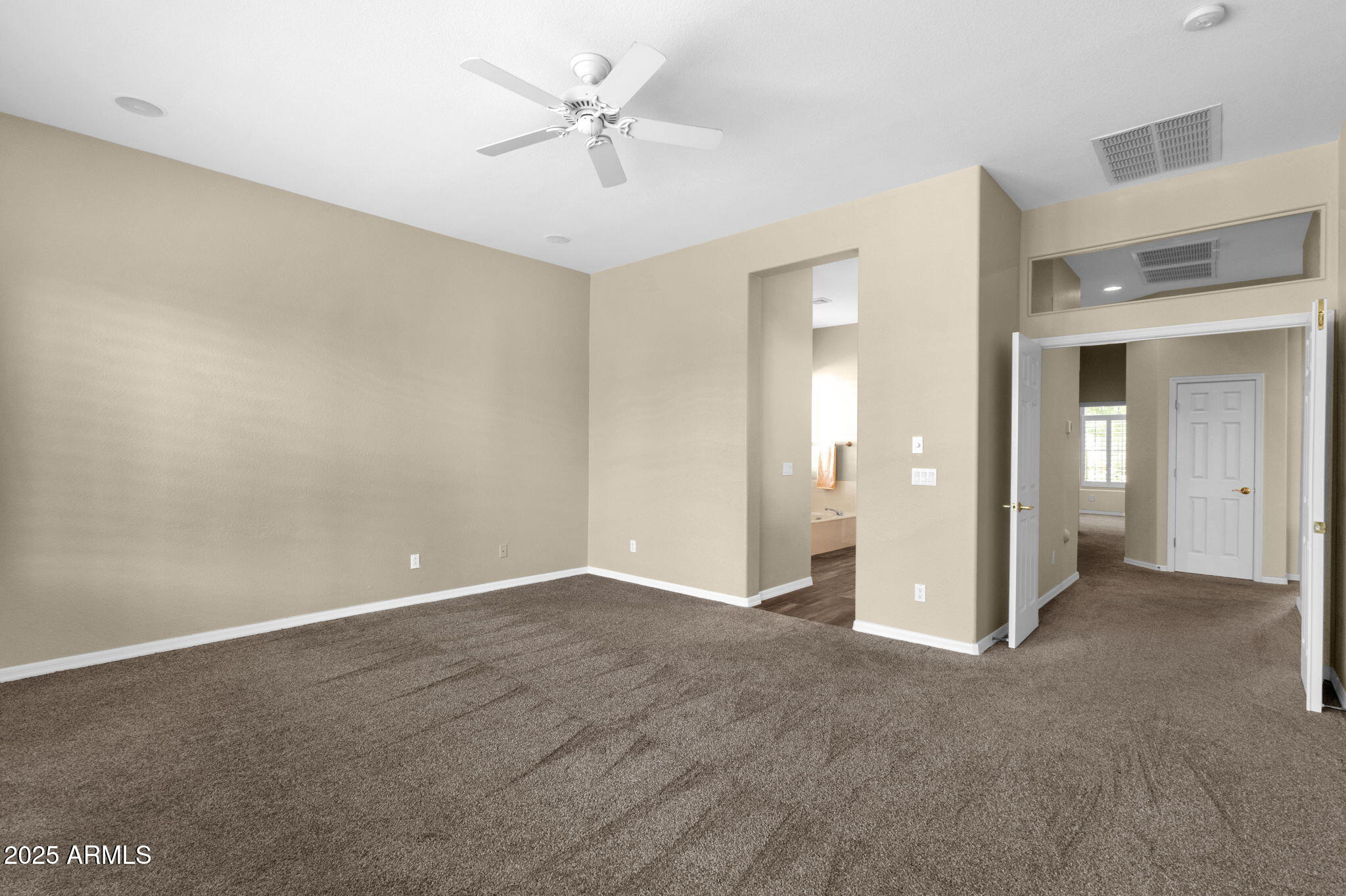 4735 East Azalea Drive Gilbert, AZ 85298 - Photo 24 of 37 an empty room with fan and entrance