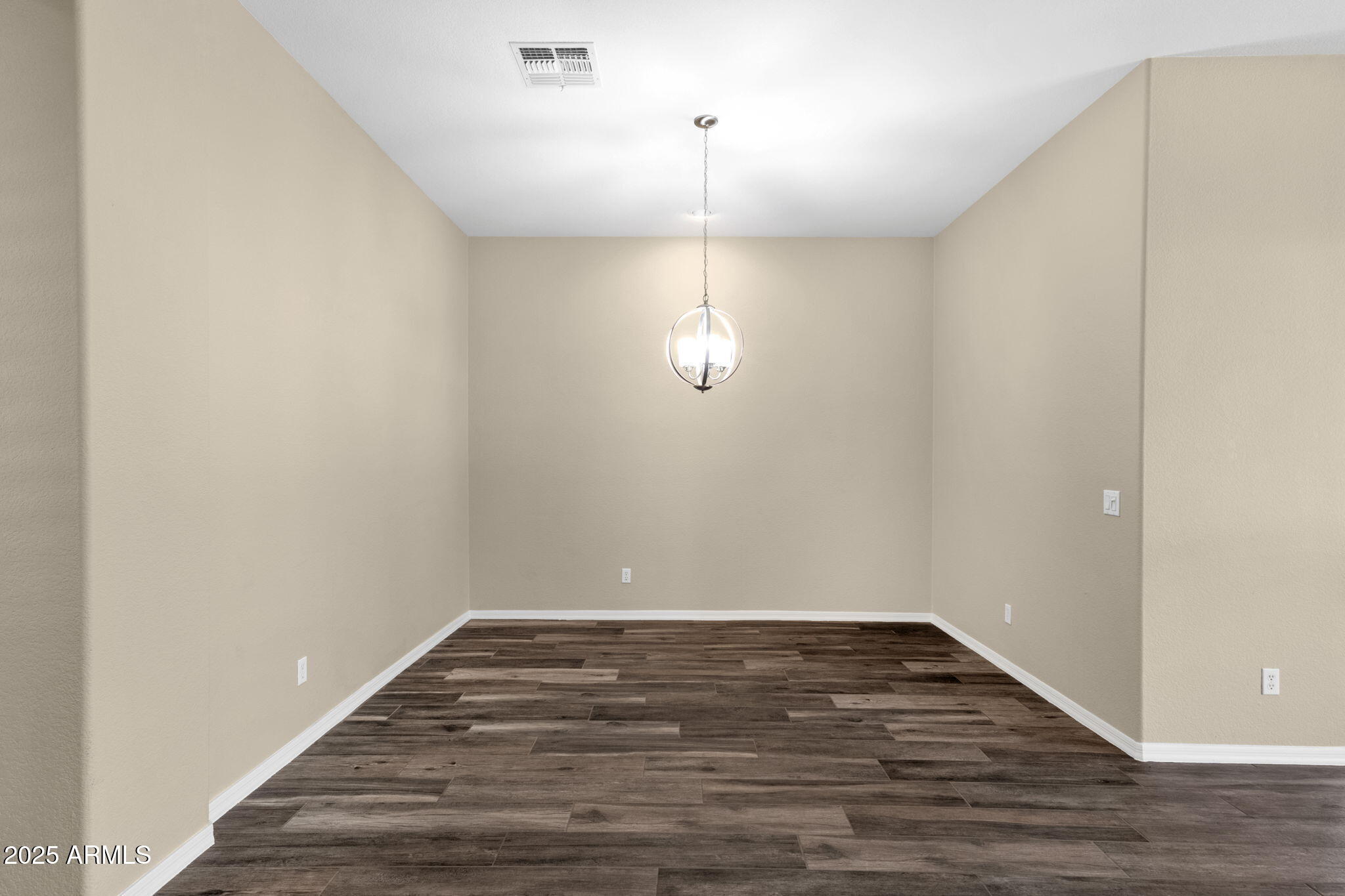 4735 East Azalea Drive Gilbert, AZ 85298 - Photo 6 of 37 a view of empty room with wooden floor and fan