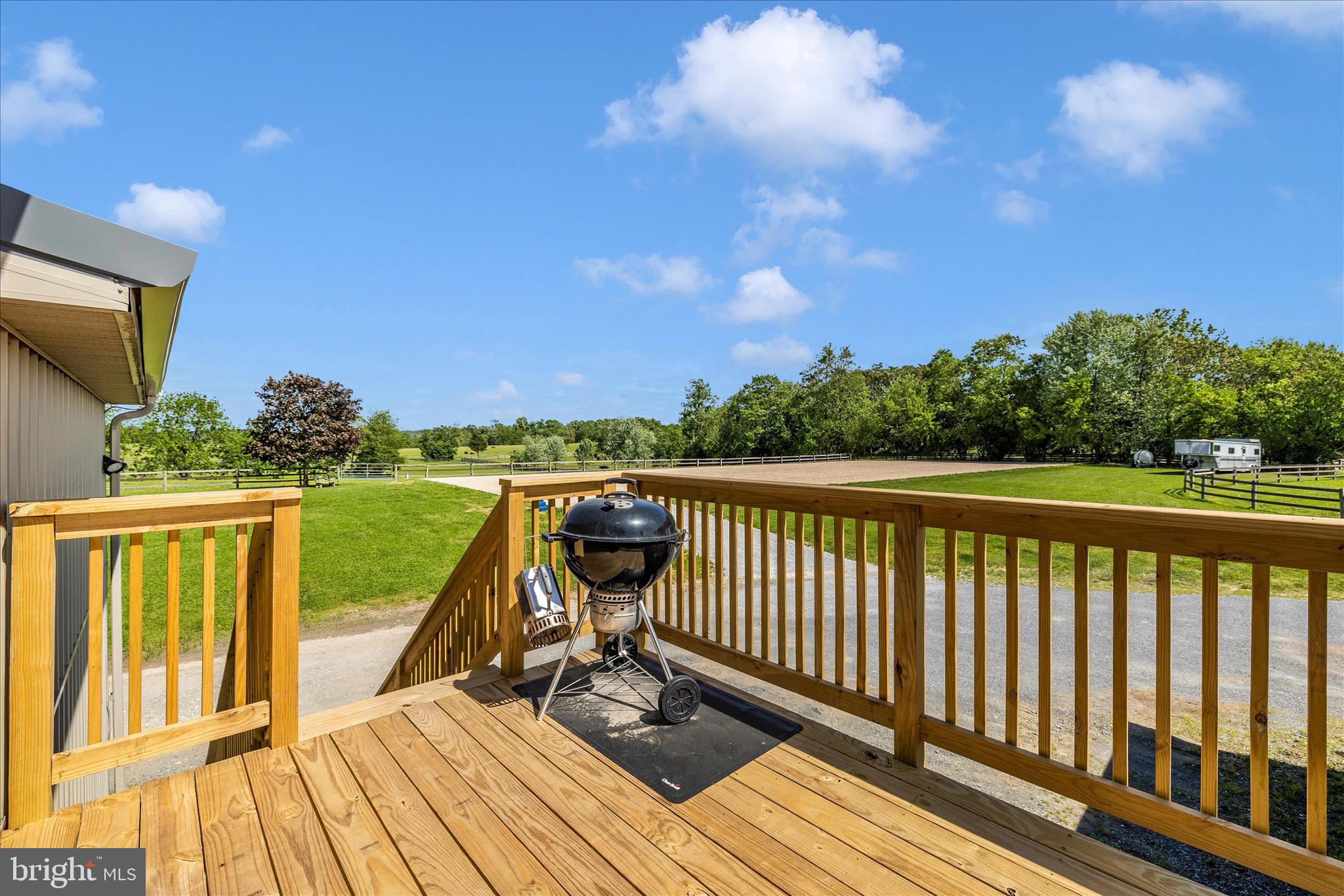 10224 Bessie Clemson Road Union Bridge, MD 21791 - Photo 32 of 46 a view of a balcony with wooden floor and fence