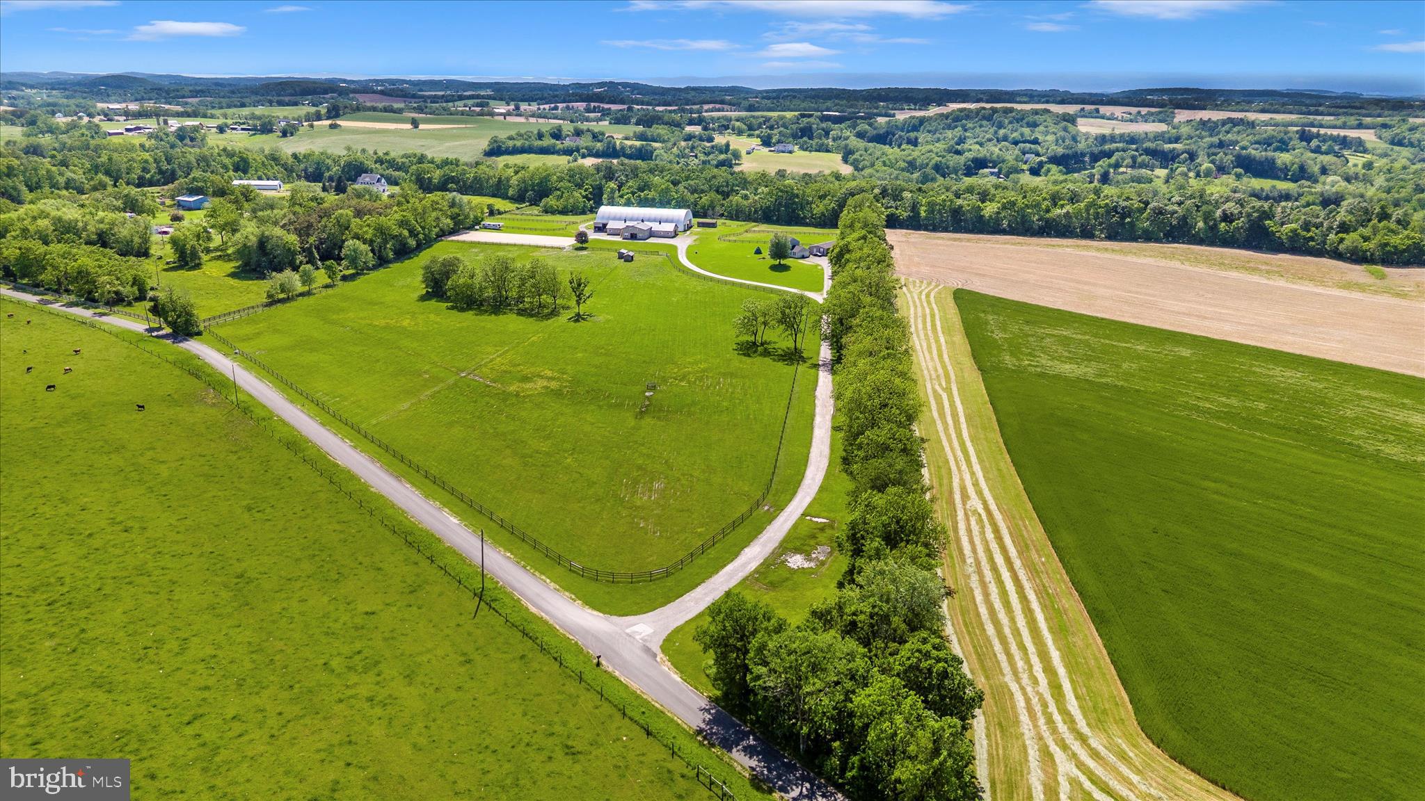 10224 Bessie Clemson Road Union Bridge, MD 21791 - Photo 38 of 46 a view of a back yard of a building with a swimming pool