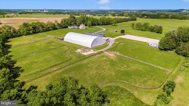 a view of a field with an ocean