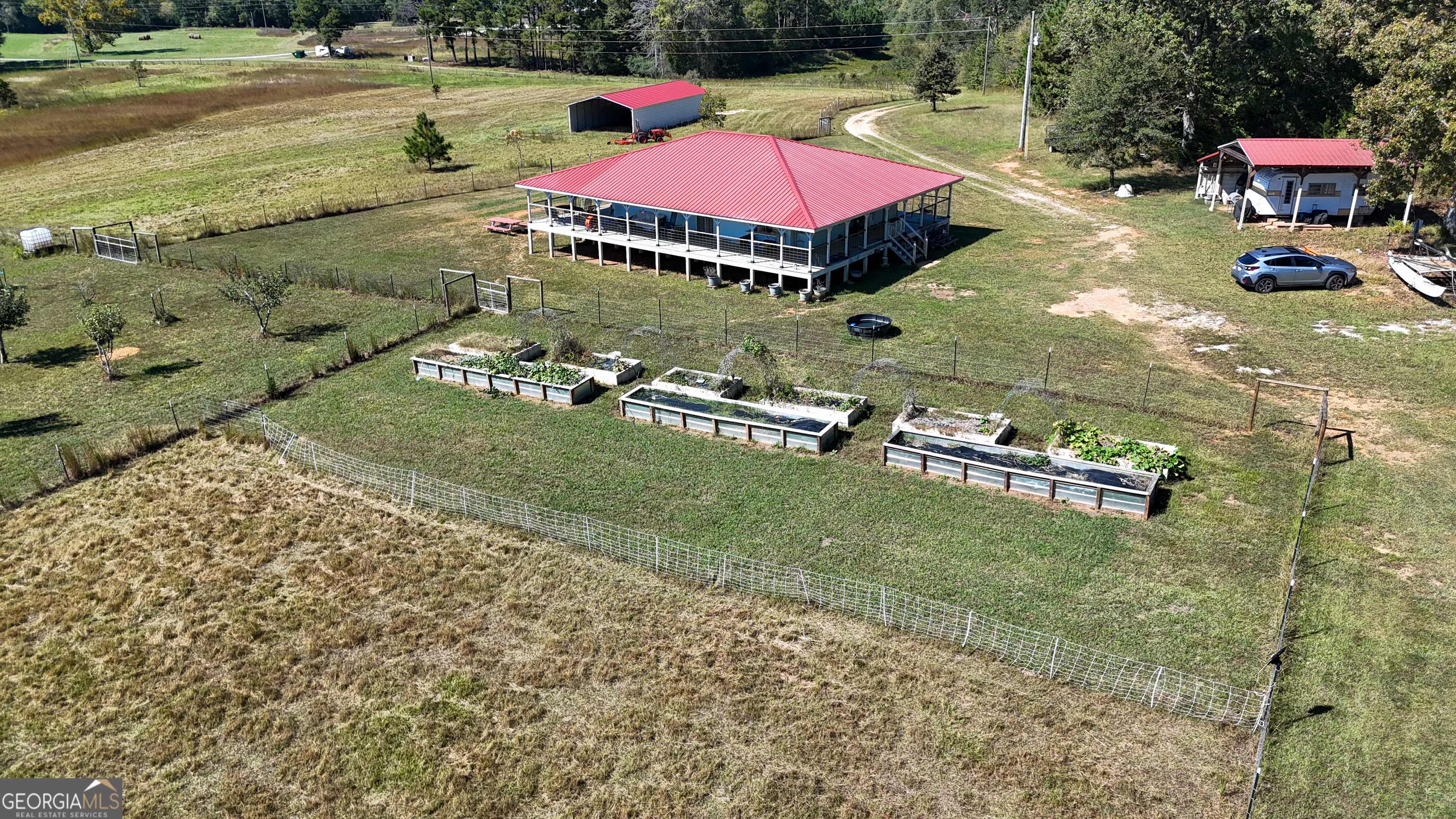 2724 Bells Ferry Road Elberton, GA 30635 - Photo 20 of 59 an aerial view of a house with a yard