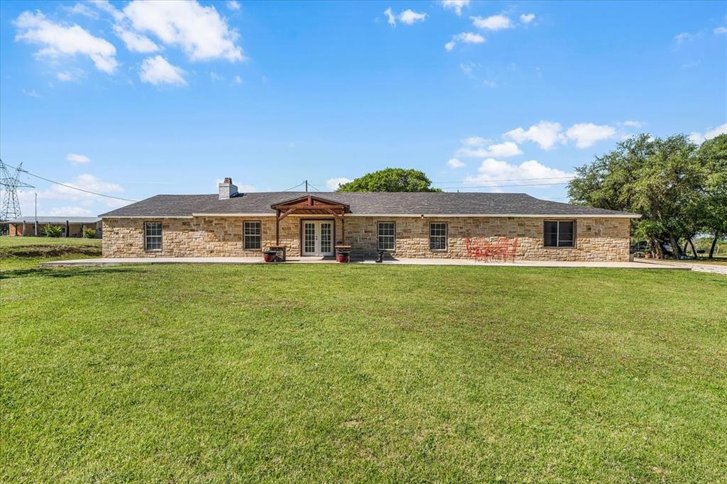 748 Rocky Ridge Lane Weatherford, TX 76085 - Photo 6 of 38 a front view of house with yard and seating area