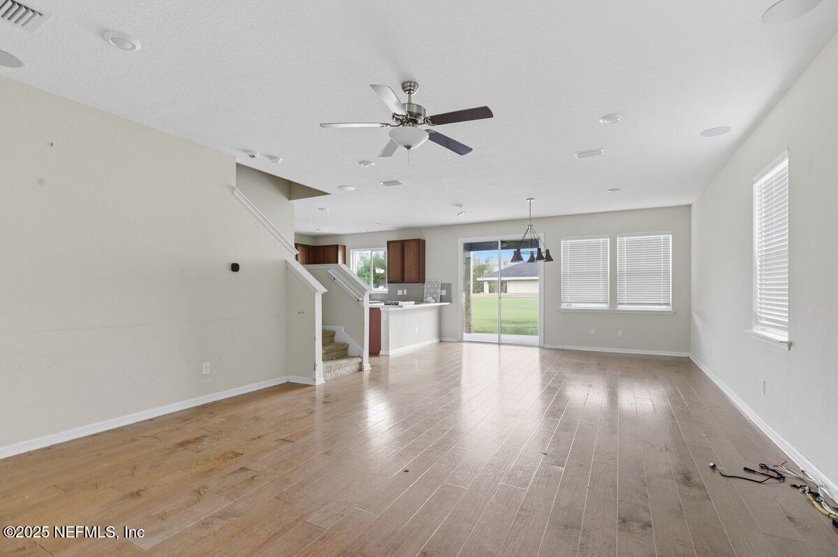 9711 Skydive Court Jacksonville, FL 32221 - Photo 7 of 20 Family Room to Kitchen (2)