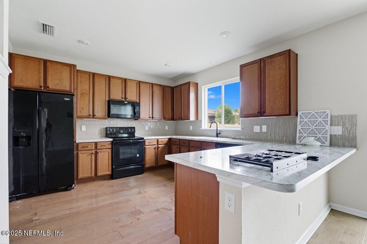 9711 Skydive Court Jacksonville, FL 32221 - Photo 8 of 20 Kitchen (40)