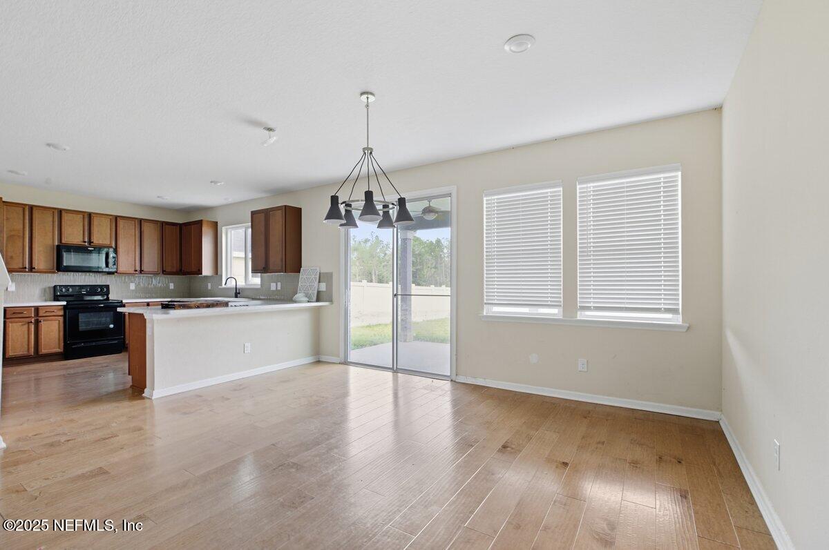 9711 Skydive Court Jacksonville, FL 32221 - Photo 10 of 20 Dining Room to Kitchen (1)