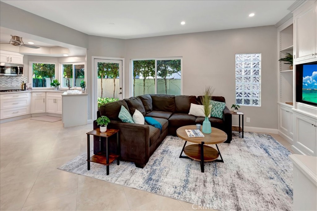 26 Imperatrice Dana Point, CA 92629 - Photo 12 of 58 a living room with furniture and a flat screen tv