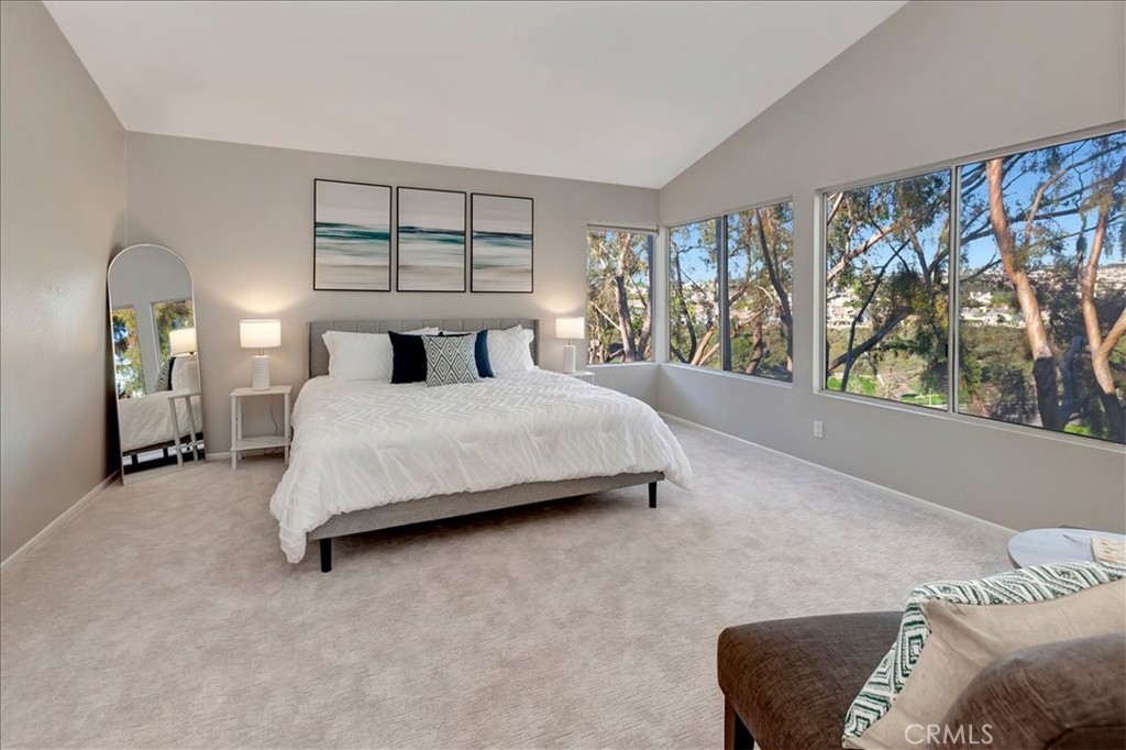 26 Imperatrice Dana Point, CA 92629 - Photo 18 of 58 a bedroom with a bed and a large window