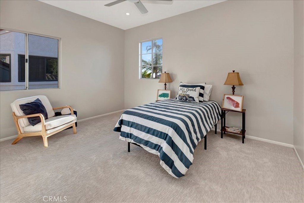 26 Imperatrice Dana Point, CA 92629 - Photo 21 of 58 a bedroom with a bed and a window