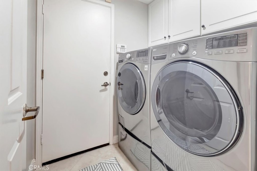 26 Imperatrice Dana Point, CA 92629 - Photo 25 of 58 a utility room with dryer and washer