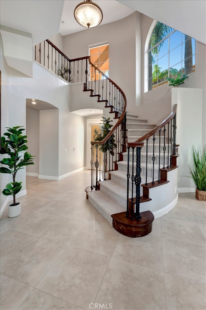 26 Imperatrice Dana Point, CA 92629 - Photo 3 of 58 a view of staircase with a potted plant and a table