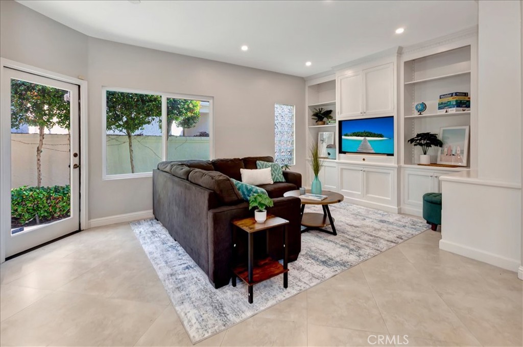 26 Imperatrice Dana Point, CA 92629 - Photo 10 of 58 a living room with furniture and a flat screen tv