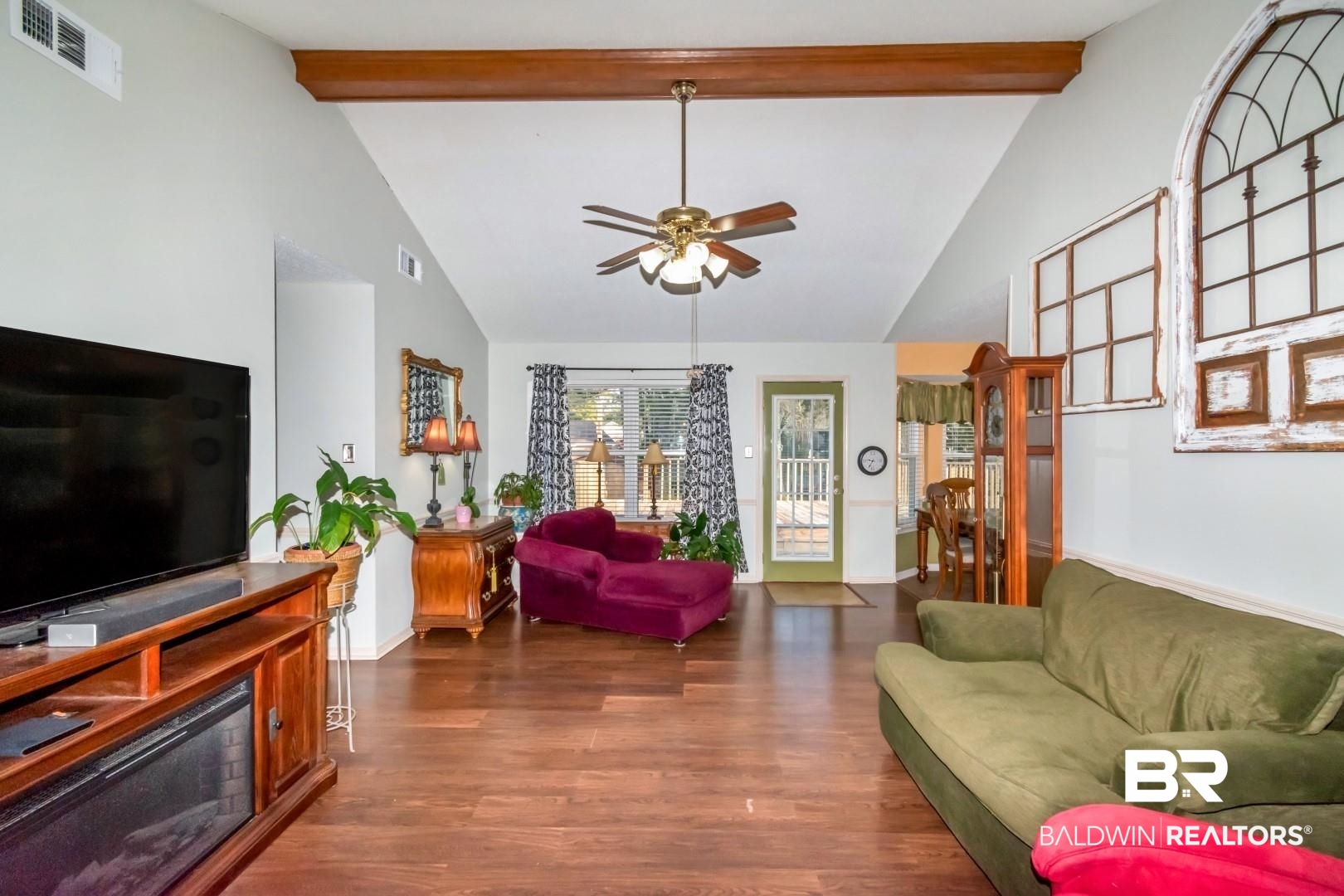 9360 Burnt Tree Drive Mobile, AL 36695 - Photo 5 of 28 Living room featuring beamed ceiling, high vaulted ceiling, ceiling fan, and dark wood-type flooring