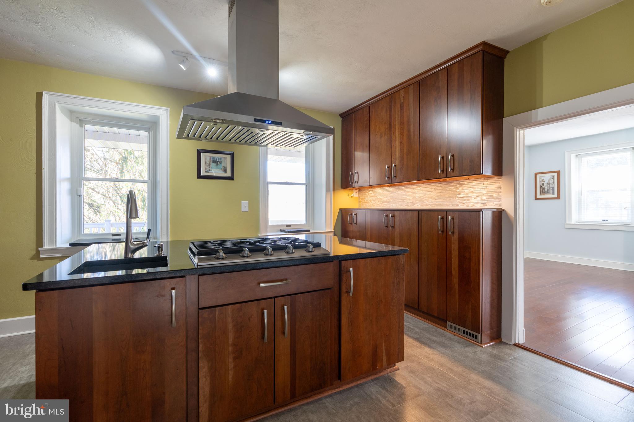 1603 Messiah Church Road Bedford, PA 15522 - Photo 12 of 114 a kitchen with kitchen island granite countertop wooden cabinets and a sink
