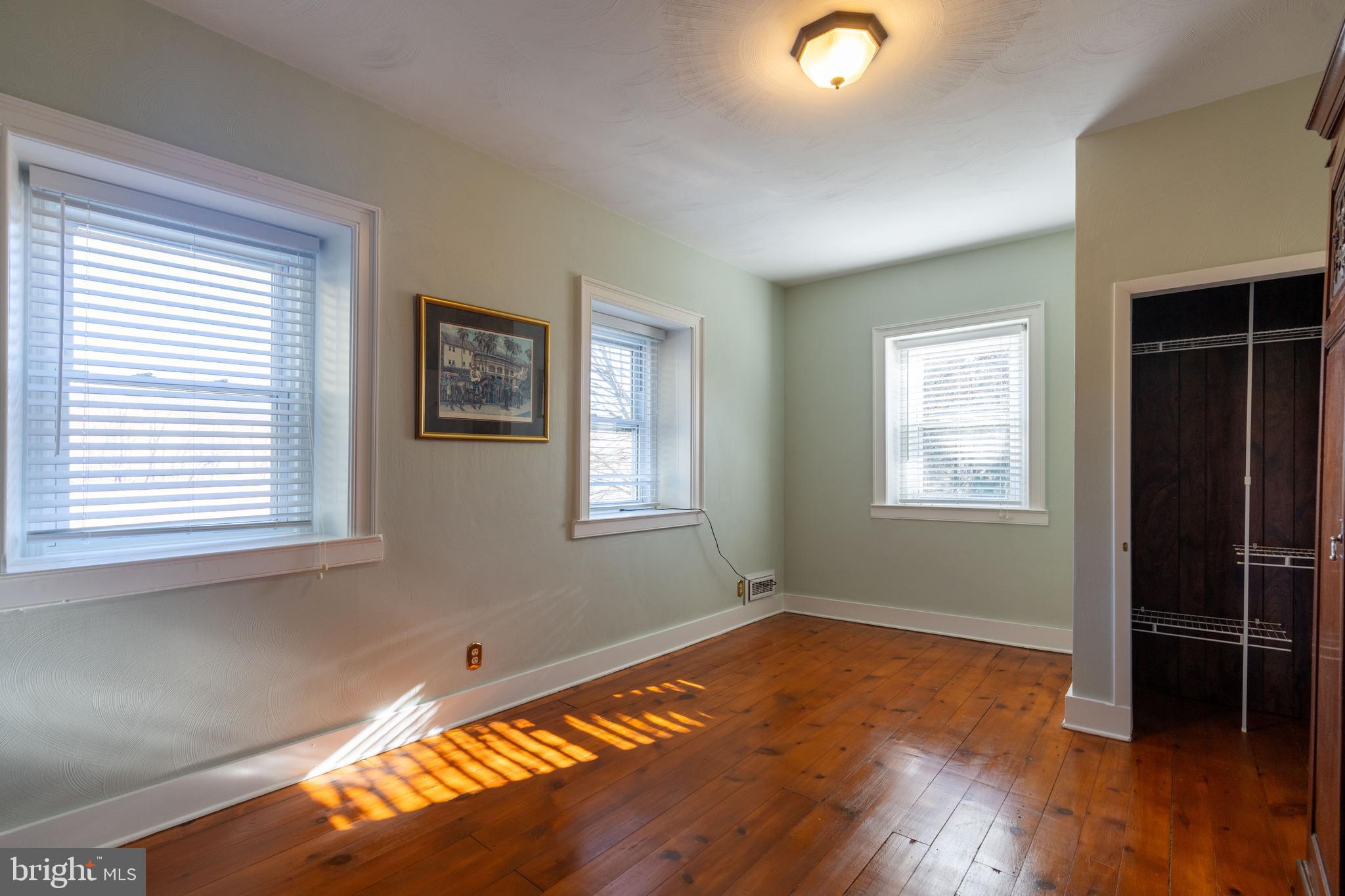 1603 Messiah Church Road Bedford, PA 15522 - Photo 36 of 114 a view of a livingroom with wooden floor and window