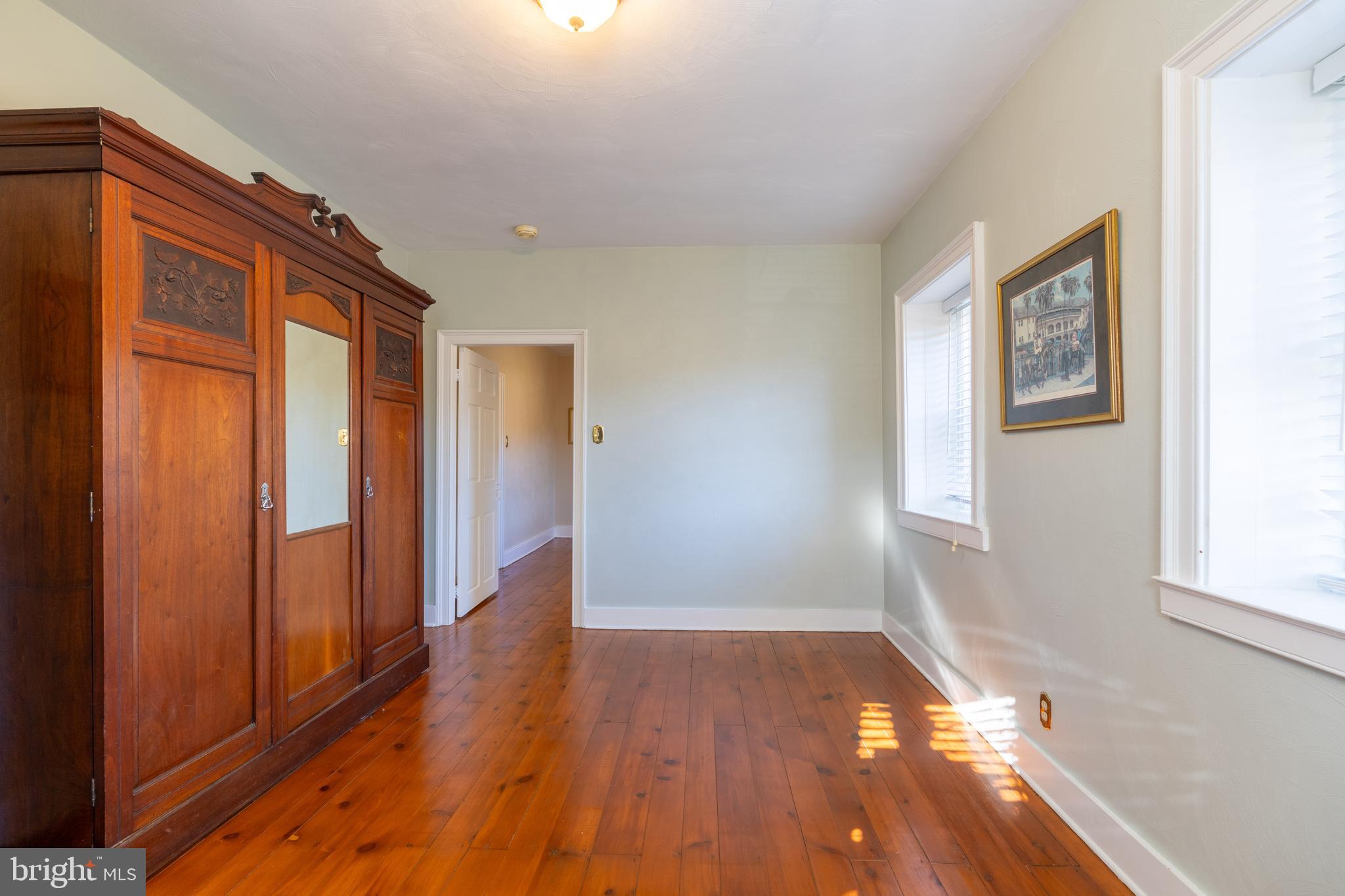 1603 Messiah Church Road Bedford, PA 15522 - Photo 38 of 114 a view of an empty room with wooden floor and a window